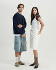 A man and a woman standing next to each other.