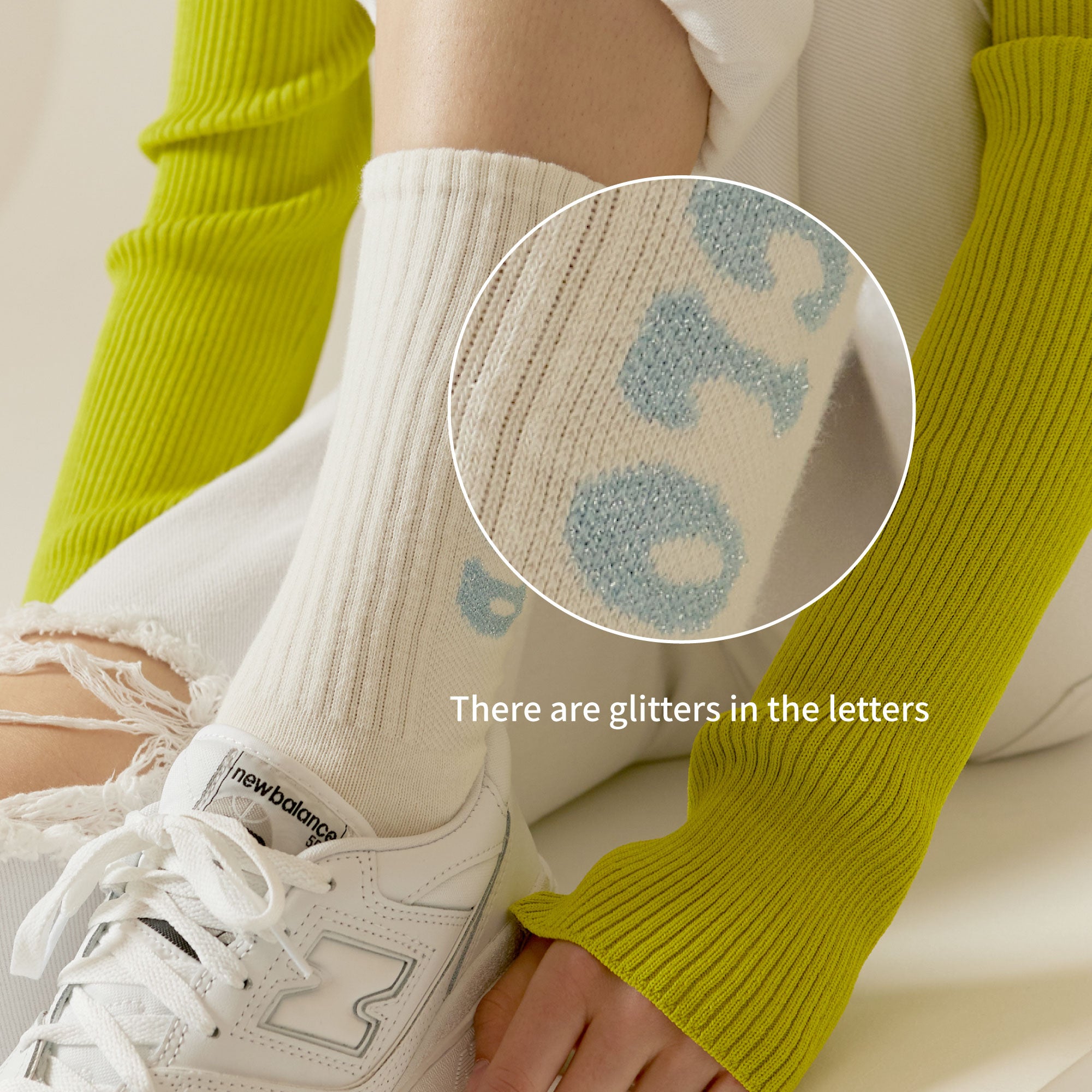 A person with a pair of tennis shoes on their feet.
