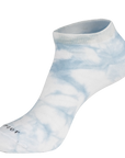 A pair of white socks with a blue tie dye pattern.