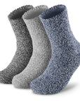 Three pairs of socks with fuzzy socks on them.