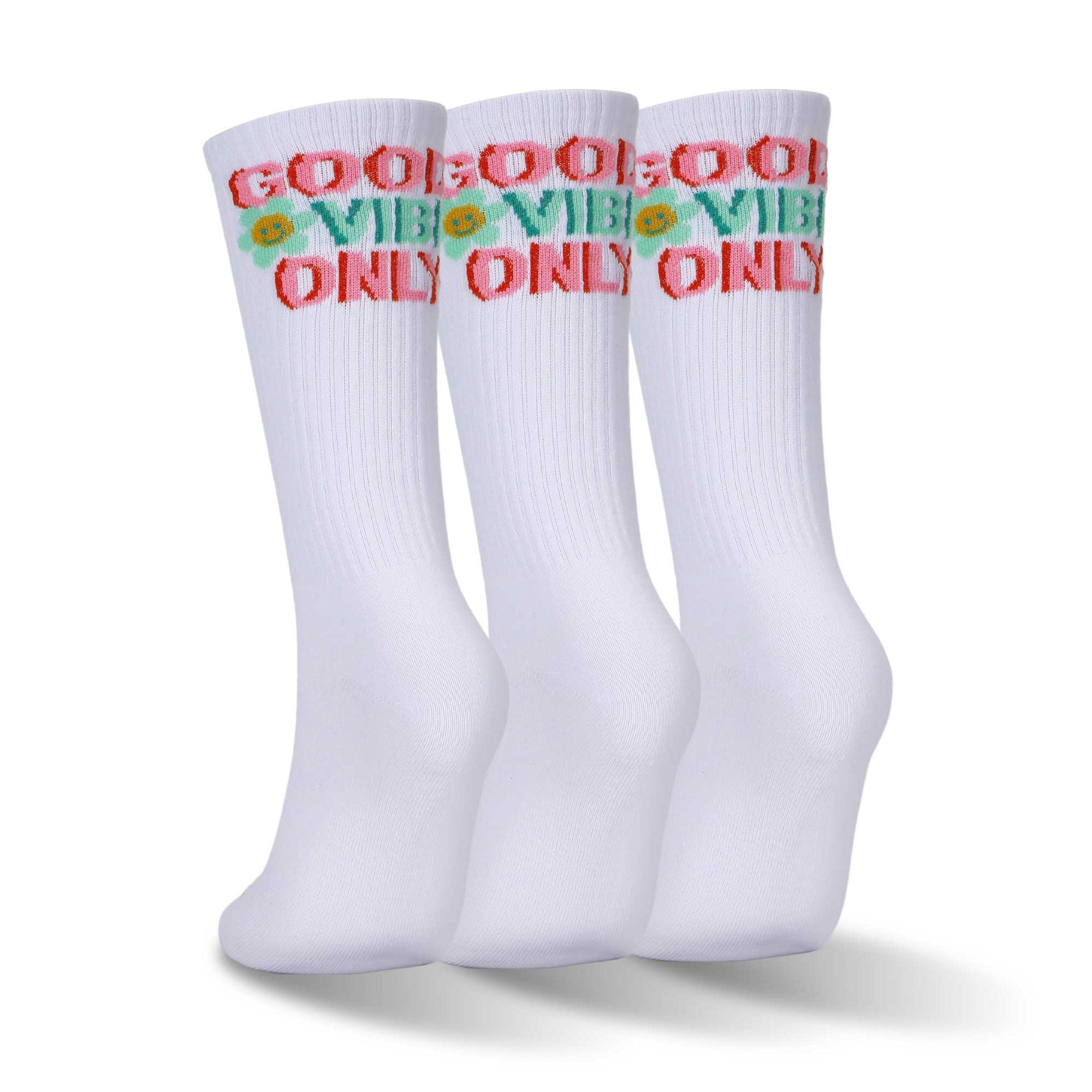 Three pair of white and red and green socks.