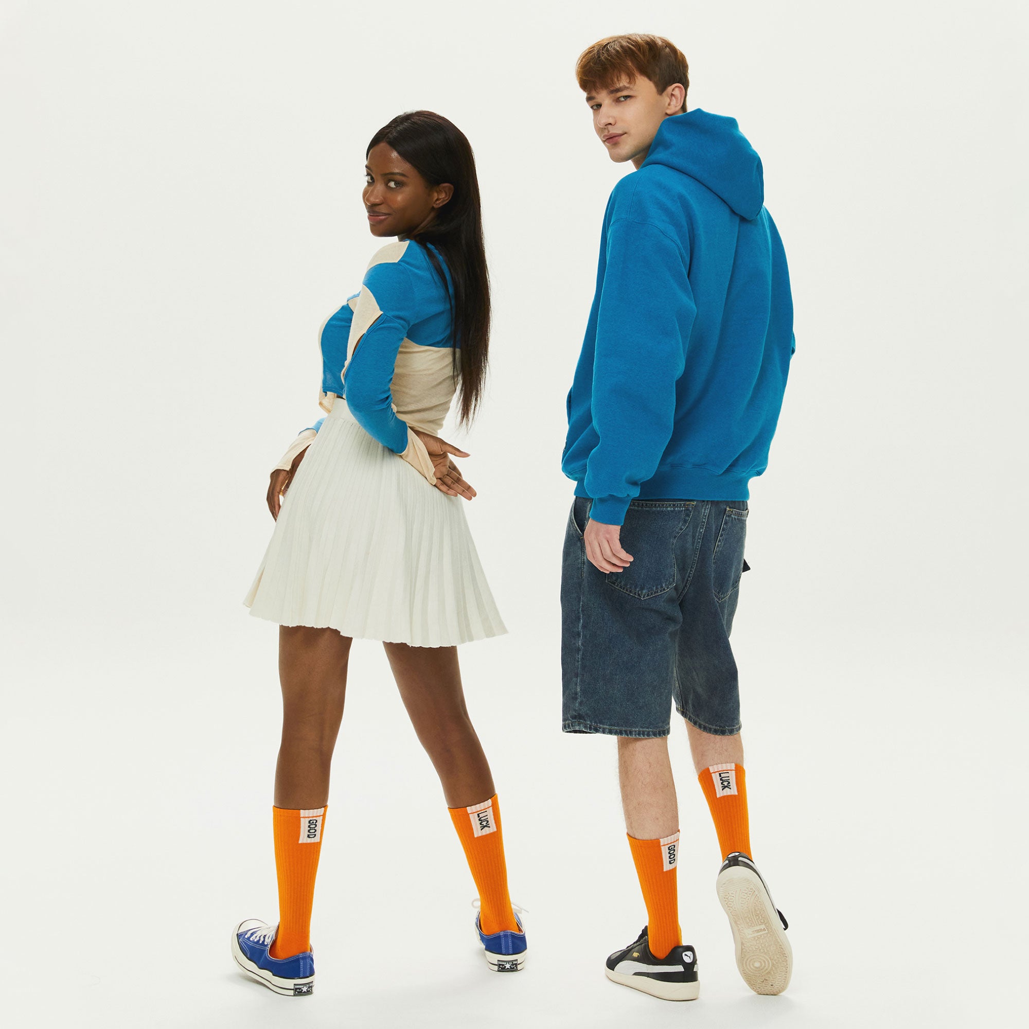 A man and a woman standing next to each other.