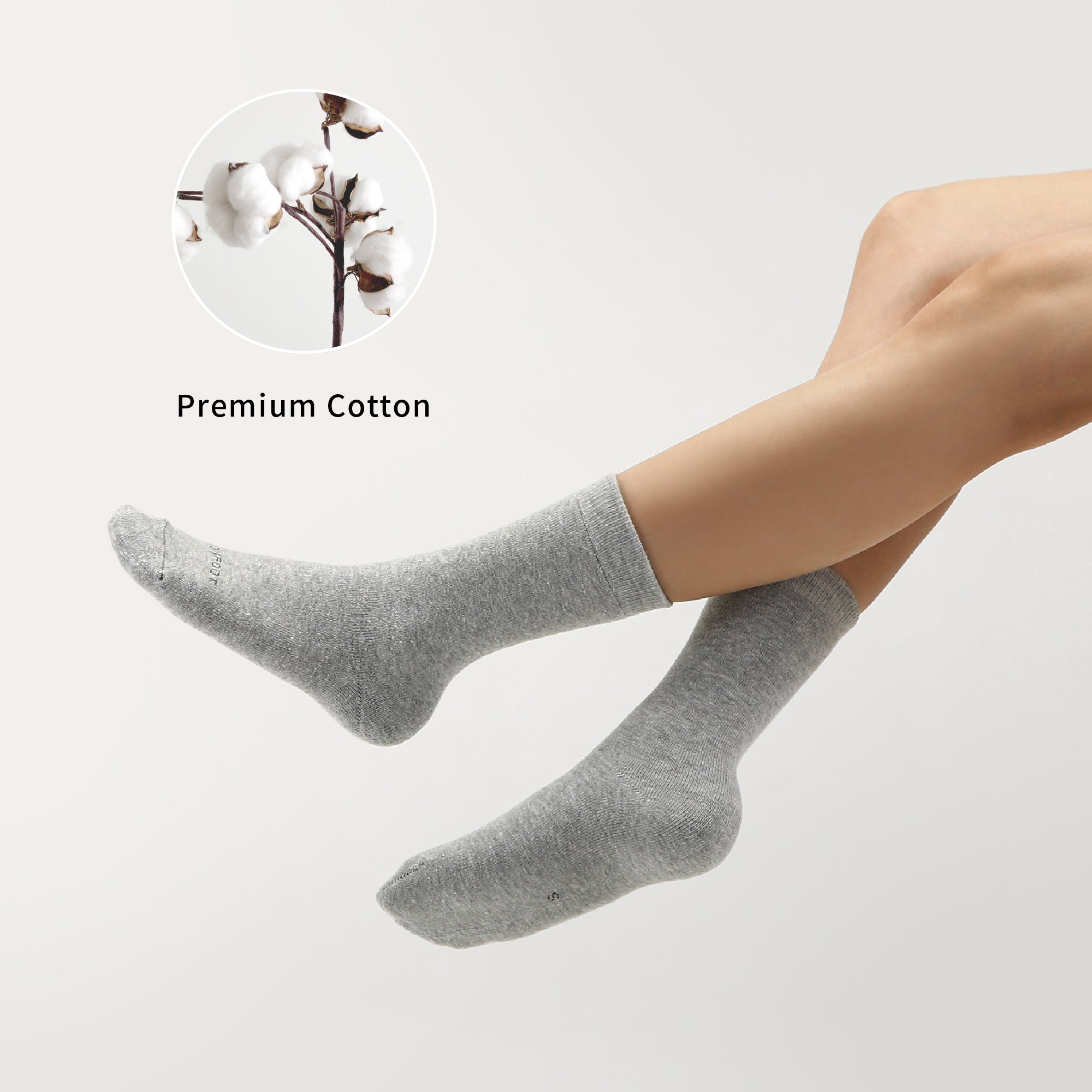 A woman's legs with cotton on them.