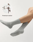 A woman's legs with cotton on them.