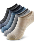 Five pairs of men's socks in various colors.