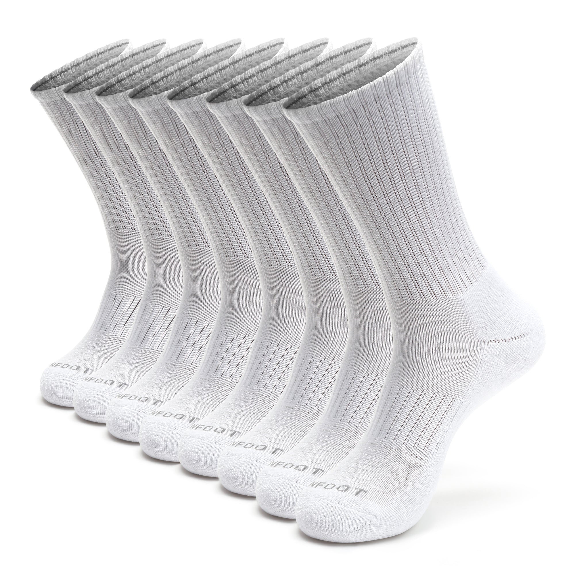 A group of white socks sitting on top of each other.