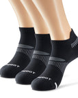 Three pair of black and white socks.