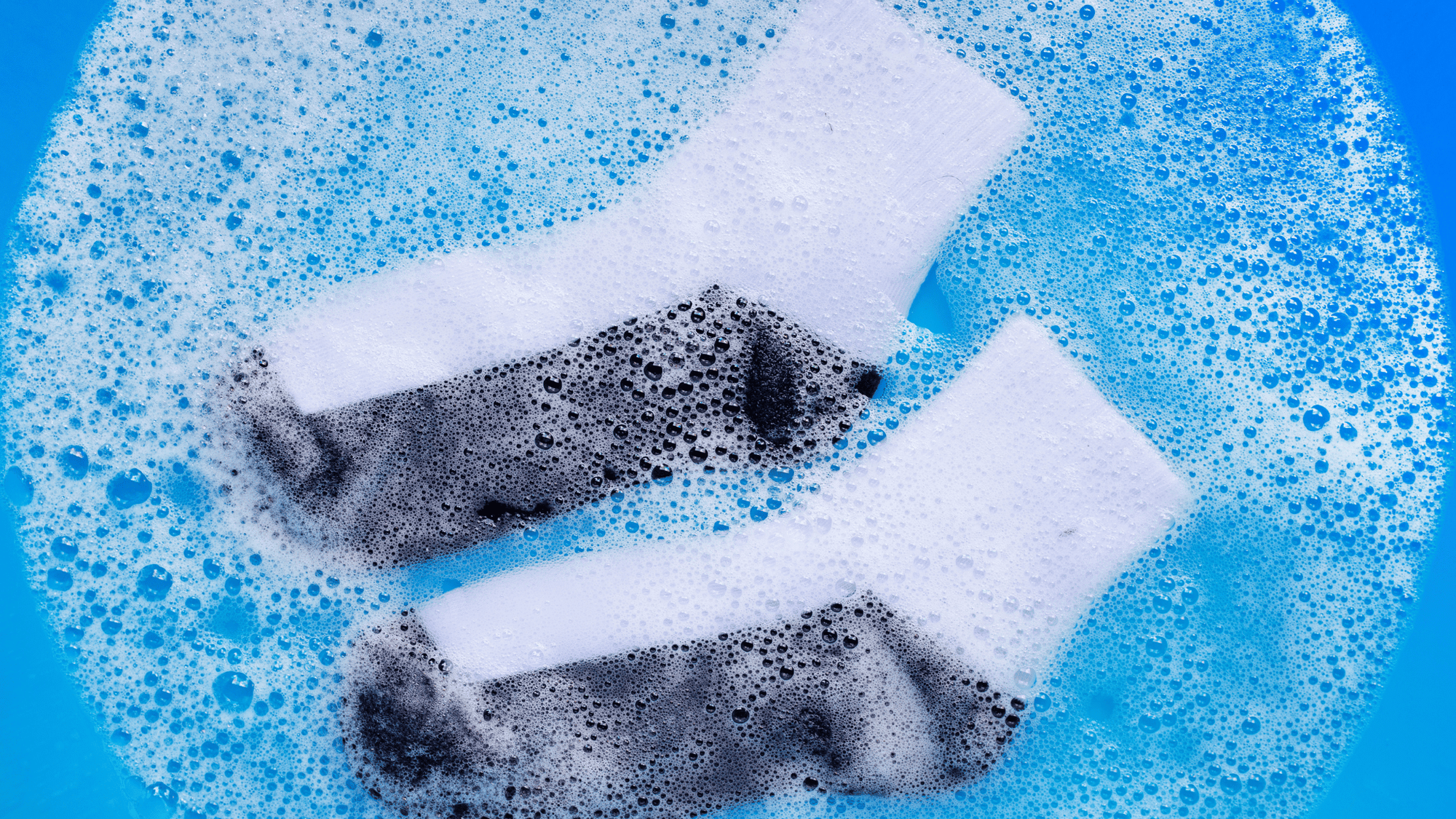 pair of socks in a soapy water
