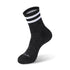 A pair of black socks with white stripes.